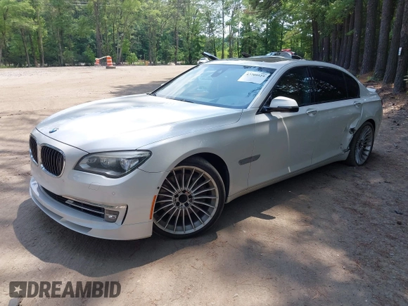 2013 BMW 7 Series 750Li with VIN WBAYE8C55DDS16013, listed as a IAAI auction lot 42709519 with 123,405 mi miles and . Bid and sale history available at DreamBid. Image 2.