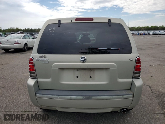 2005 Mercury Mariner Luxury z VIN 4M2YU56145DJ14548, wystawiony jako Copart lot #56871115 z przebiegiem 114 729 mil mil oraz Czysty tytuł • Clean title. Historia ofert i sprzedaży dostępna na DreamBid. Obrazek 6.