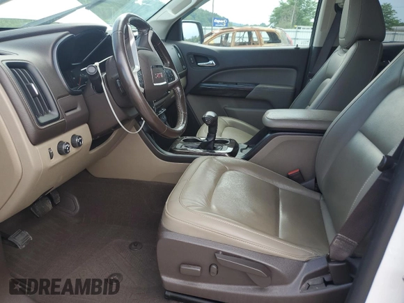 2019 GMC Canyon 4WD SLT with VIN 1GTG6DEN8K1274729, listed as a Copart auction lot 60804575 with 107,382 mi miles and Salvage title. Bid and sale history available at DreamBid. Image 7.