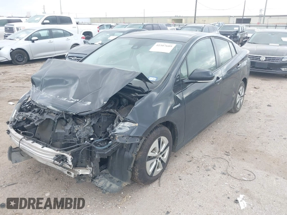 2017 Toyota Prius Two with VIN JTDKBRFU2H3052287, listed as a IAAI auction lot 41507689 with 82,205 mi miles and . Bid and sale history available at carsss.com. Image 2.