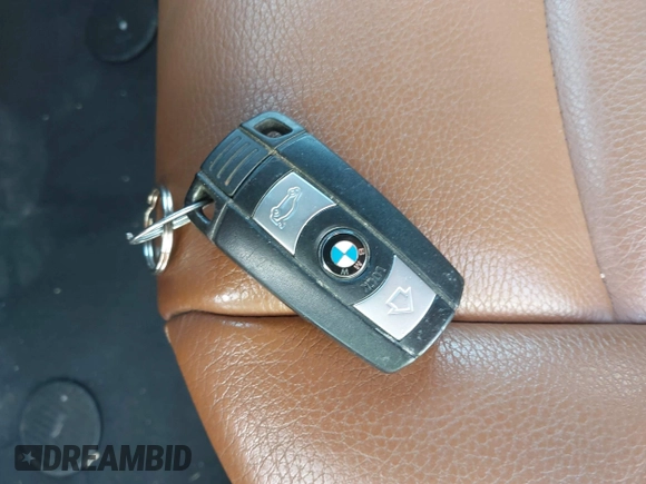 2011 BMW 3 Series 335i with VIN WBADX7C56BE579057, listed as a IAAI auction lot 42295405 with 107,160 mi miles and . Bid and sale history available at DreamBid. Image 11.