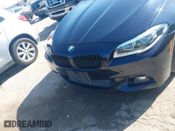 2014 BMW 5 Series 535i with VIN WBA5B1C50ED481703, listed as a IAAI auction lot 41856996 with 105,057 mi miles and . Bid and sale history available at DreamBid. Image 12.
