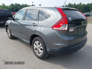 2012 Honda CR-V EX-L with VIN 2HKRM4H73CH634074, listed as a IAAI auction lot 42611285 with 299,348 mi miles and . Bid and sale history available at DreamBid. Image 3.
