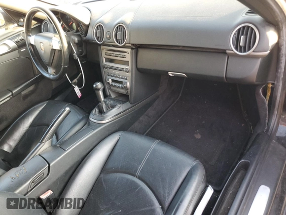 2005 Porsche Boxster z VIN WP0CA29885U711749, wystawiony jako Copart lot #84301684 z przebiegiem 272 856 mil mil oraz Szkoda całkowita • Salvage title. Historia ofert i sprzedaży dostępna na DreamBid. Obrazek 8.