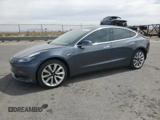 2019 Tesla Model 3 Mid Range z VIN 5YJ3E1EA2KF417212, wystawiony jako Copart lot #50968615 z przebiegiem 104 807 mil mil oraz Szkody całkowita. Historia ofert i sprzedaży dostępna na DreamBid. Obrazek 1.