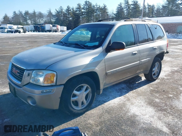 2002 GMC Envoy SLT with VIN 1GKDT13S822154592, listed as a IAAI auction lot 41389285 with 153,897 mi miles. Bid and sale history available at carsss.com. Image 2.