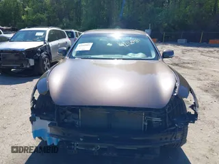 2015 Infiniti Q70 z VIN JN1BY1AR1FM560845, wystawiony jako IAAI lot #42165981 z przebiegiem 75 767 mil mil oraz . Historia ofert i sprzedaży dostępna na DreamBid. Obrazek 13.