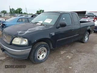 2000 Ford F-150 XL with VIN 1FTRX17L6YKA30614, listed as a IAAI auction lot 42110031 with Not provided miles and . Bid and sale history available at DreamBid. Image 2.