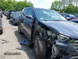 2014 Hyundai Santa Fe with VIN 5XYZUDLB6EG218980, listed as a IAAI auction lot 42391630 with 136,710 mi miles and . Bid and sale history available at DreamBid. Image 6.