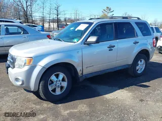2008 Ford Escape XLT with VIN 1FMCU031X8KE76869, listed as a IAAI auction lot 41802935 with 155,746 mi miles. Bid and sale history available at carsss.com. Image 17.