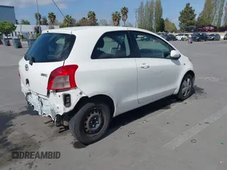 2008 Toyota Yaris with VIN JTDJT923885151383, listed as a IAAI auction lot 42057847 with 272,985 mi miles. Bid and sale history available at carsss.com. Image 4.