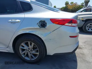 2019 Kia Optima LX z VIN 5XXGT4L34KG340899, wystawiony jako IAAI lot #42445116 z przebiegiem 118 188 mil mil oraz . Historia ofert i sprzedaży dostępna na DreamBid. Obrazek 6.