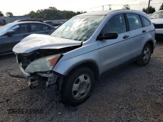 2011 Honda CR-V LX z VIN 5J6RE4H30BL013034, wystawiony jako Copart lot #65649575 z przebiegiem 234 160 mil mil oraz Szkoda całkowita • Salvage title. Historia ofert i sprzedaży dostępna na DreamBid. Obrazek 1.
