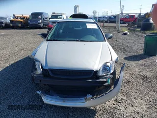 1999 Honda Civic EX with VIN 1HGEJ8242XL025414, listed as a IAAI auction lot 41736378 with 206,342 mi miles. Bid and sale history available at carsss.com. Image 12.