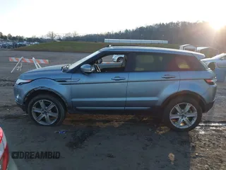 2013 Land Rover Range Rover Evoque Pure Premium z VIN SALVR2BG2DH707604, wystawiony jako IAAI lot #41199994 z przebiegiem 115 922 mil mil oraz . Historia ofert i sprzedaży dostępna na DreamBid. Obrazek 14.