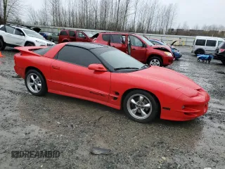 1998 Pontiac Firebird Formula z VIN 2G2FV22G4W2200991, wystawiony jako Copart lot #84553624 z przebiegiem 129 605 mil mil oraz Szkoda całkowita • Salvage title. Historia ofert i sprzedaży dostępna na DreamBid. Obrazek 4.