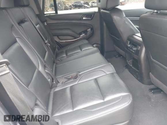 2020 Chevrolet Tahoe LT with VIN 1GNSKBKC2LR253012, listed as a IAAI auction lot 41870002 with 127,789 mi miles and . Bid and sale history available at DreamBid. Image 8.