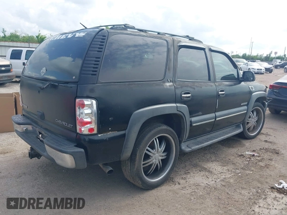 2002 Chevrolet Tahoe LT with VIN 1GNEC13Z22J335701, listed as a IAAI auction lot 42134758 with 250,668 mi miles and . Bid and sale history available at DreamBid. Image 4.