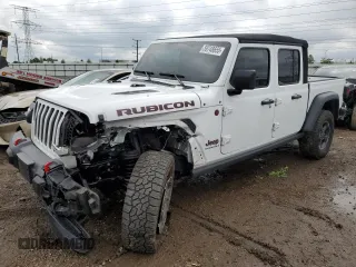 2023 Jeep Gladiator Rubicon с VIN 1C6JJTBG6PL566676, выставлен на аукционе Copart как лот 59748655 с пробегом 34 607 миль миль и Списание • Salvage title. История ставок и продаж доступна на DreamBid. Изображение 1.