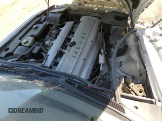 1996 Jaguar XJ with VIN SAJHX1747TC767829, listed as a Copart auction lot 76677444 with Not provided miles and Salvage title. Bid and sale history available at DreamBid. Image 11.