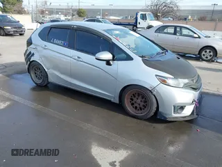 2015 Honda Fit LX with VIN 3HGGK5G55FM773903, listed as a IAAI auction lot 41615475 with 197,945 mi miles. Bid and sale history available at carsss.com. Image 1.