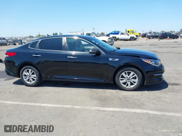 2016 Kia Optima LX with VIN 5XXGT4L32GG038471, listed as a IAAI auction lot 42614892 with 102,781 mi miles and . Bid and sale history available at DreamBid. Image 13.