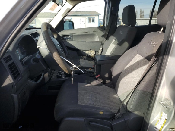 2009 Jeep Liberty Sport with VIN 1J8GN28K19W548688, listed as a Copart auction lot 46870705 with 104,427 mi miles and Salvage Title. Bid and sale history available at carsss.com. Image 7.