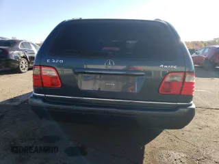 1999 Mercedes-Benz E-Class with VIN WDBJH82F4XX026758, listed as a Copart auction lot 76740804 with 136,782 mi miles and Salvage Title. Bid and sale history available at carsss.com. Image 6.