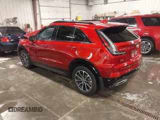 2024 Cadillac XT4 AWD Sport z VIN 1GYFZFR42RF154352, wystawiony jako IAAI lot #41249916 z przebiegiem 27 378 mil mil oraz . Historia ofert i sprzedaży dostępna na DreamBid. Obrazek 3.