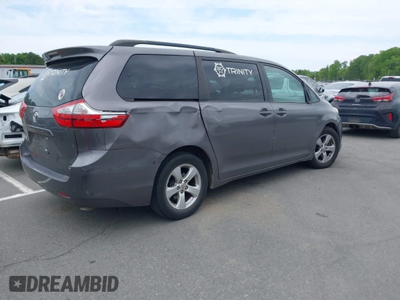 2015 Toyota Sienna LE AAS with VIN 5TDKK3DC5FS610247, listed as a IAAI auction lot 42033460 with 260,962 mi miles and . Bid and sale history available at DreamBid. Image 4.