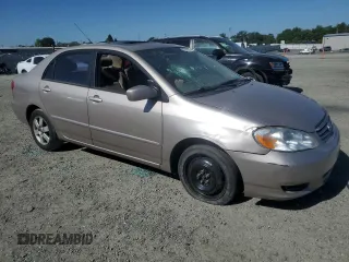 2003 Toyota Corolla CE with VIN 1NXBR38E33Z084761, listed as a Copart auction lot 55859545 with 205,938 mi miles and Salvage Title. Bid and sale history available at DreamBid. Image 4.