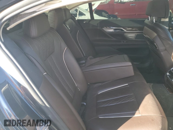 2020 BMW 7 Series 750i xDrive with VIN WBA7U2C05LGM27144, listed as a Copart auction lot 77827854 with 0 mi miles and Salvage Title. Bid and sale history available at carsss.com. Image 10.