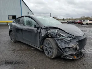 2024 Tesla Model Y Long Range with VIN 7SAYGDEE2RF131085, listed as a Copart auction lot 50171055 with Not Provided miles and Salvage Title. Bid and sale history available at DreamBid. Image 4.
