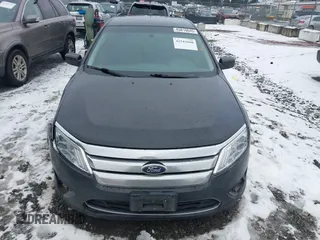 2012 Ford Fusion SE z VIN 3FAHP0HG2CR323380, wystawiony jako IAAI lot #41543660 z przebiegiem 169 059 mil mil oraz . Historia ofert i sprzedaży dostępna na DreamBid. Obrazek 12.