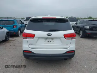 2016 Kia Sorento LX with VIN 5XYPG4A37GG055639, listed as a IAAI auction lot 41888968 with 140,431 mi miles. Bid and sale history available at carsss.com. Image 16.