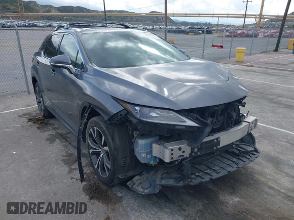 2020 Lexus RX with VIN 2T2HZMAA3LC153100, listed as a IAAI auction lot 41925188 with 104,216 mi miles. Bid and sale history available at carsss.com. Image 1.