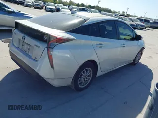 2017 Toyota Prius Two z VIN JTDKARFU0H3043350, wystawiony jako IAAI lot #41707190 z przebiegiem 145 542 mil mil oraz . Historia ofert i sprzedaży dostępna na DreamBid. Obrazek 4.