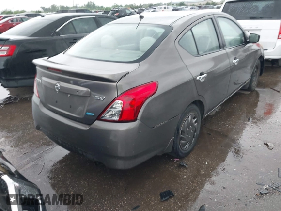 2015 Nissan Versa SV with VIN 3N1CN7AP0FL881056, listed as a IAAI auction lot 42106423 with 134,760 mi miles. Bid and sale history available at carsss.com. Image 4.