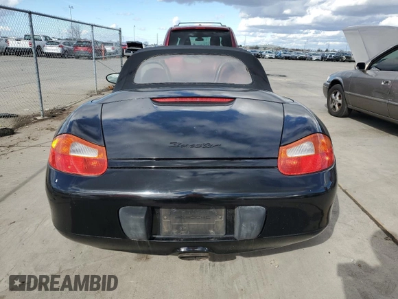 2000 Porsche Boxster z VIN WP0CA2988YU627807, wystawiony jako Copart lot #45522955 z przebiegiem 120 384 mil mil oraz Szkody całkowita. Historia ofert i sprzedaży dostępna na DreamBid. Obrazek 6.