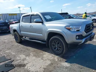 2023 Toyota Tacoma SR with VIN 3TYCZ5ANXPT141762, listed as a IAAI auction lot 41878289 with 7,481 mi miles and . Bid and sale history available at DreamBid. Image 1.