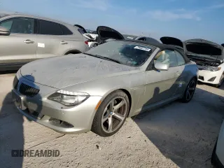 2008 BMW 6 Series 650i with VIN WBAEB53568CX60574, listed as a Copart auction lot 75687704 with 0 mi miles and Salvage Title. Bid and sale history available at carsss.com. Image 1.