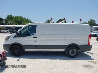 2015 Ford Transit Cargo z VIN 1FTNE1YM9FKA16926, wystawiony jako IAAI lot #42493994 z przebiegiem 218 427 mil mil oraz . Historia ofert i sprzedaży dostępna na DreamBid. Obrazek 14.