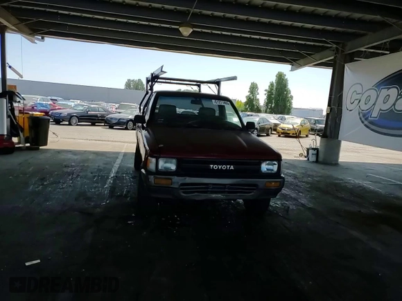 1991 Toyota Pickup with VIN JT4RN81A8M0064727, listed as a Copart auction lot 61271465 with 226,758 mi miles and Salvage title. Bid and sale history available at DreamBid. Image 13.