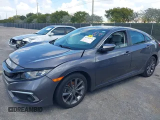 2021 Honda Civic Sedan EX with VIN 19XFC1F34ME001481, listed as a IAAI auction lot 41943440 with 35,851 mi miles. Bid and sale history available at carsss.com. Image 2.