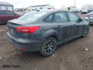 2017 Ford Focus SEL with VIN 1FADP3H27HL221776, listed as a IAAI auction lot 41631699 with 176,424 mi miles. Bid and sale history available at carsss.com. Image 4.