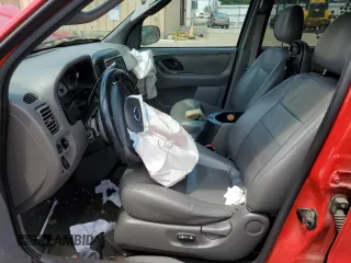 2002 Ford Escape XLT Choice с VIN 1FMYU03152KC71778, выставлен на аукционе Copart как лот 61072285 с пробегом Не указан миль и Списание • Salvage title. История ставок и продаж доступна на DreamBid. Изображение 7.