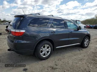 2013 Dodge Durango SXT with VIN 1C4RDJAG0DC693413, listed as a Copart auction lot 51777405 with 160,231 mi miles and Salvage Title. Bid and sale history available at carsss.com. Image 3.