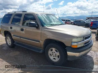 2004 Chevrolet Tahoe LS with VIN 1GNEC13V44J242193, listed as a IAAI auction lot 39754712 with 156,518 mi miles. Bid and sale history available at carsss.com. Image 1.