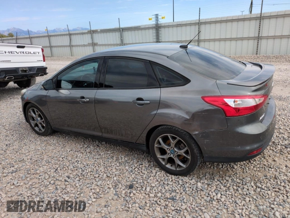 2013 Ford Focus SE with VIN 1FADP3F24DL189897, listed as a Copart auction lot 61970155 with 212,218 mi miles and Salvage title. Bid and sale history available at DreamBid. Image 2.