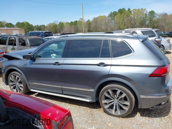 2018 Volkswagen Tiguan SEL Premium with VIN 3VV5B7AX4JM201579, listed as a IAAI auction lot 41932201 with 118,728 mi miles and . Bid and sale history available at DreamBid. Image 14.